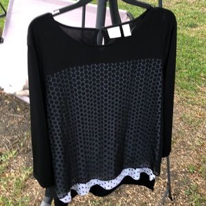 Black top with poke a dots underneath